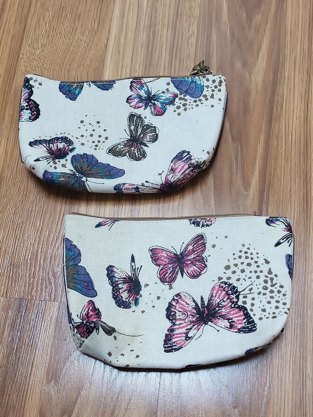 2 Sisley Butterfly Print Cosmetic Pouches in Cream, Pink, Blue